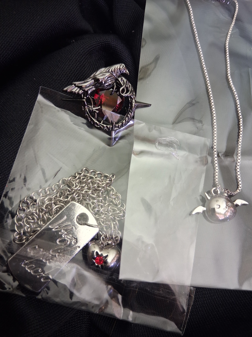 Love & deepspace Anime Cosplay and Caleb Neclaces & a Ruby Crow brooch